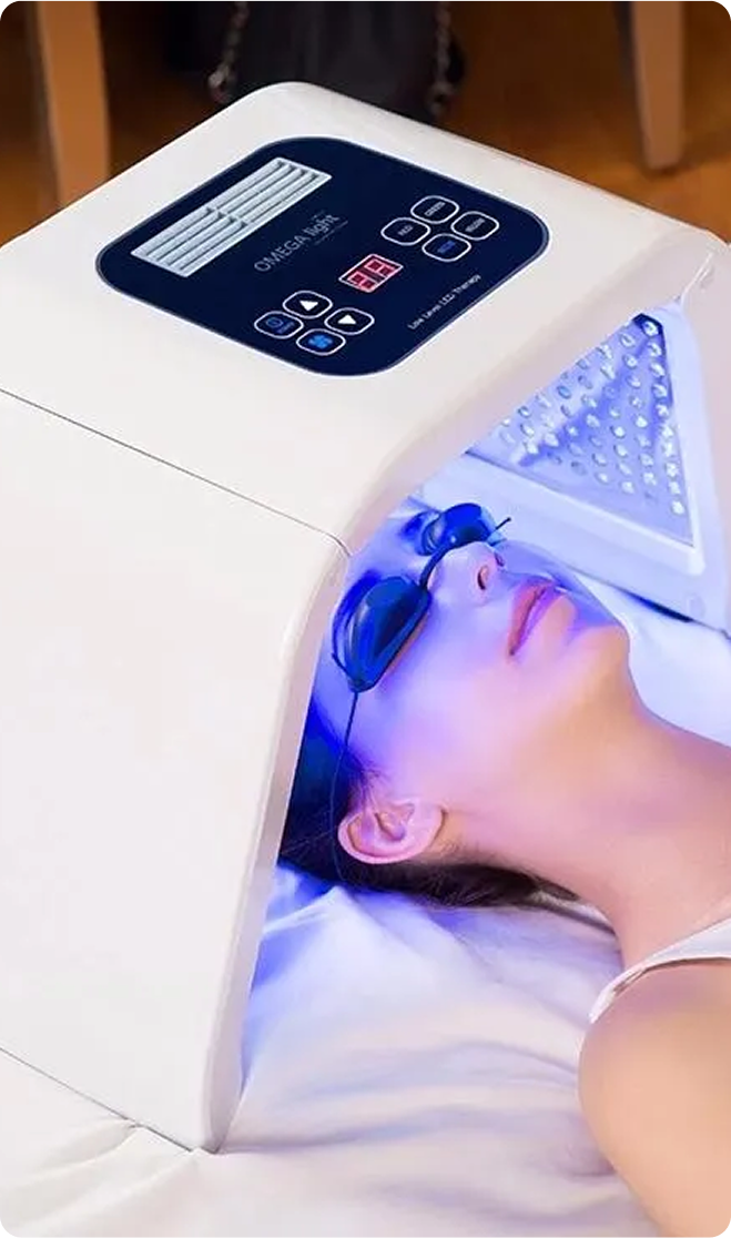 Woman using Vivosse LED Mask
